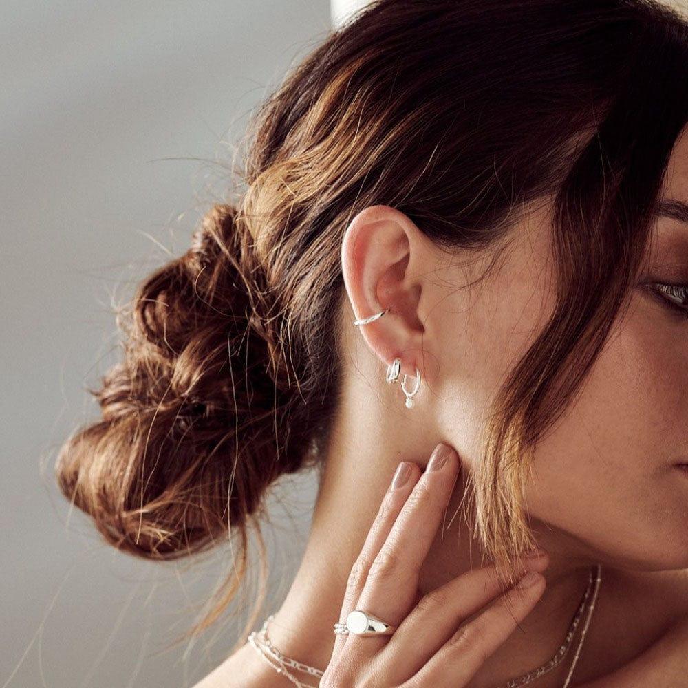 Orelia Mini Domed Clean Huggie Hoop Earrings - Silver