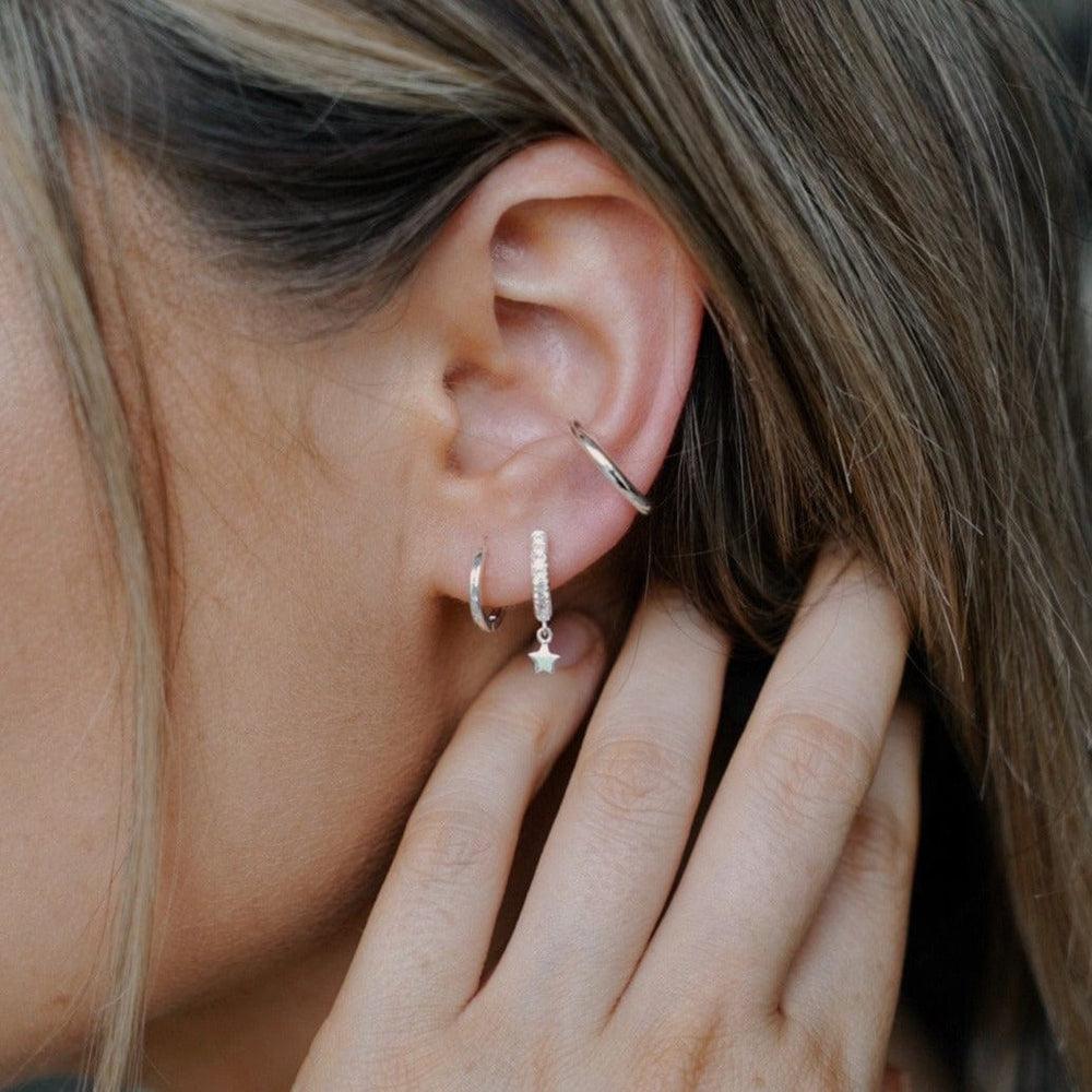 Orelia Clean Metal Huggie Hoop Earrings - Silver