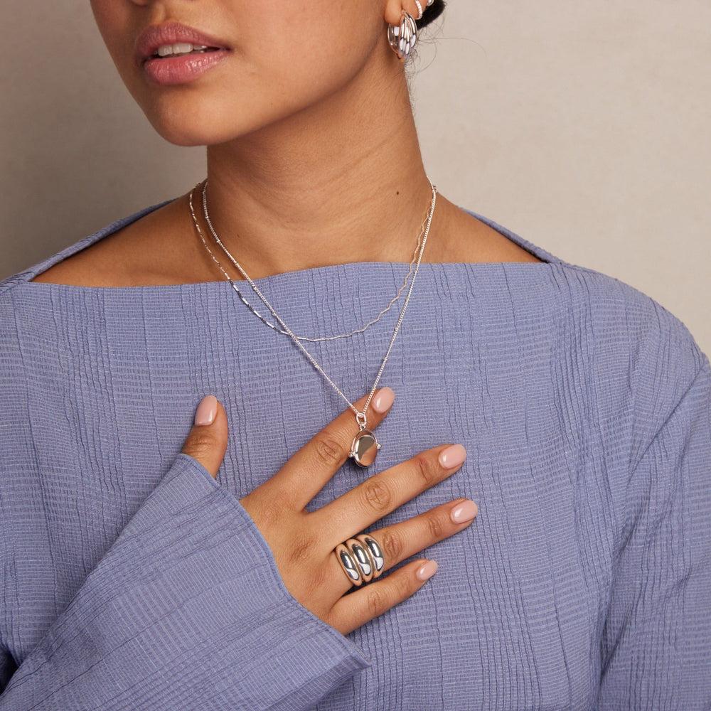 Orelia LUXE Faceted Disc Spinner Necklace - Silver