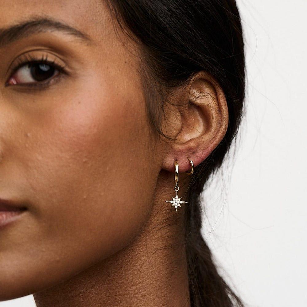 Orelia Starburst Huggie Hoop Earrings - Gold