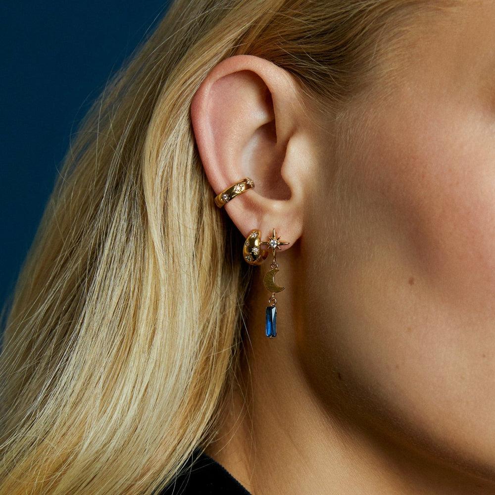 Orelia Tapered Crystal Starburst Huggie Hoop Earrings - Gold