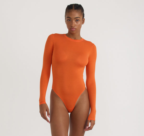 organic basics Soft Touch Veil Open Back Bodysuit Tangerine