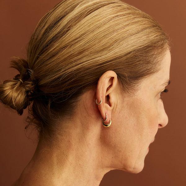 Otiumberg Essential Huggie Hoops 9kt Solid Gold