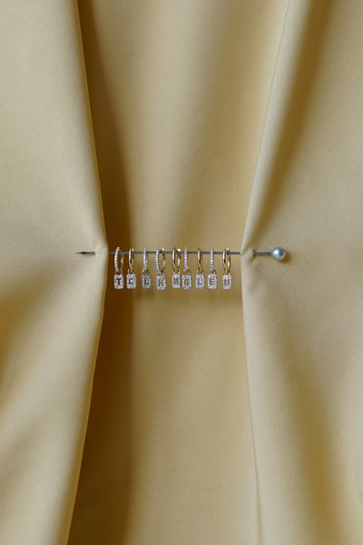 Otiumberg Tiny Diamond Initial Earring Charm & Mini Oval Hoop 9kt Solid Gold