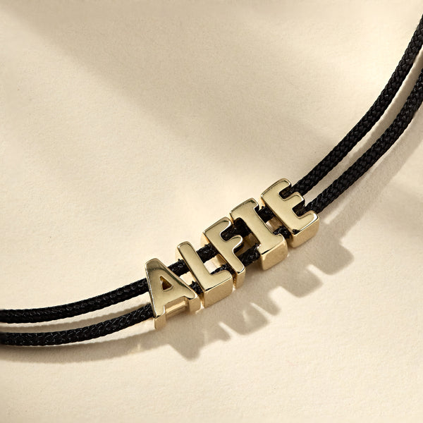 Otiumberg Totem Name Black Cord Bracelet (Made To Order) 9kt Solid Gold