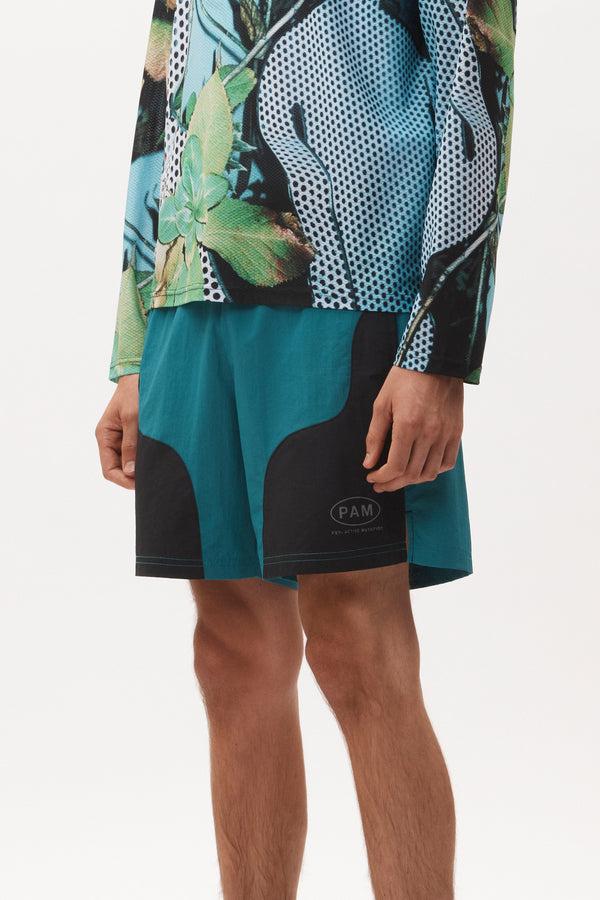 p.a.m. perks and mini CHOOSE FREEWHEELING TRACK SHORTS - BLACK/TEAL