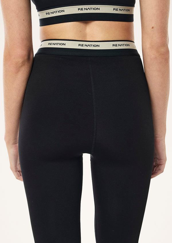 p.e nation Avant full length legging in black & biscuit