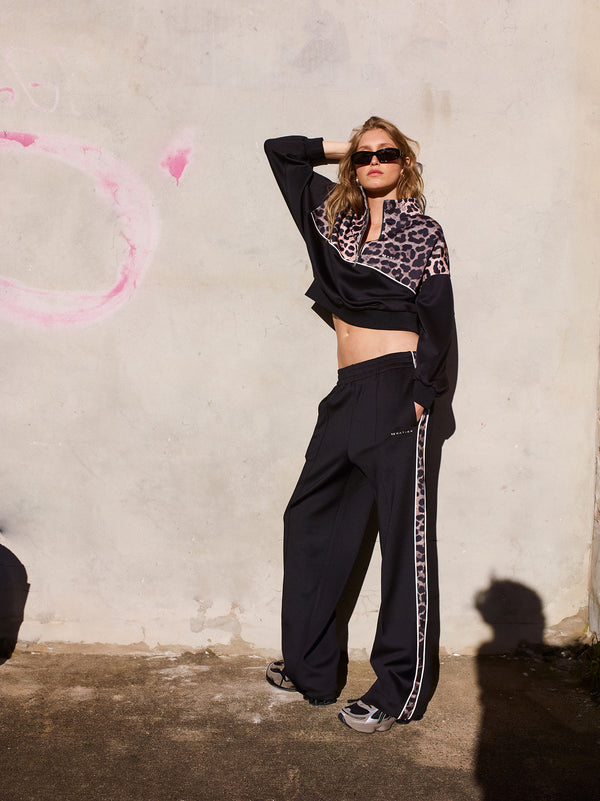 p.e nation Boundless zip neck sweat in black & leopard