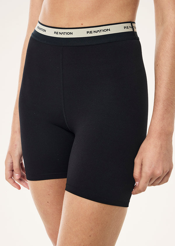 p.e nation Avant 5" bike short in black & biscuit
