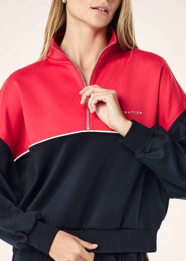 p.e nation Boundless zip neck sweat in strawberry