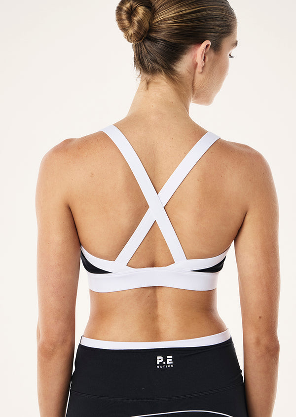 p.e nation Flow sports bra in black