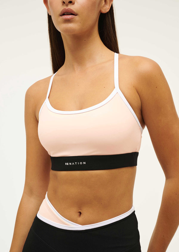 p.e nation Signature sports bra in blush