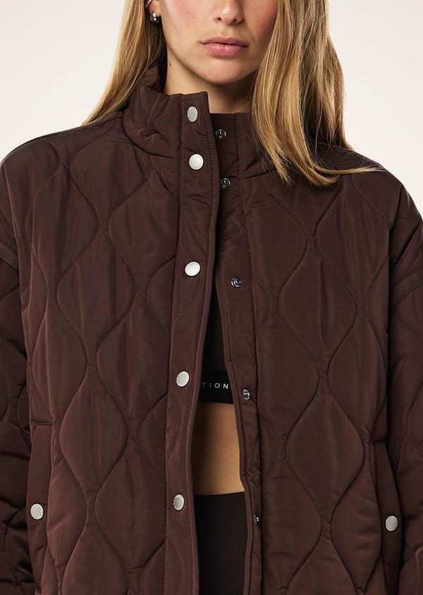 p.e nation Surge quilt jacket in espresso