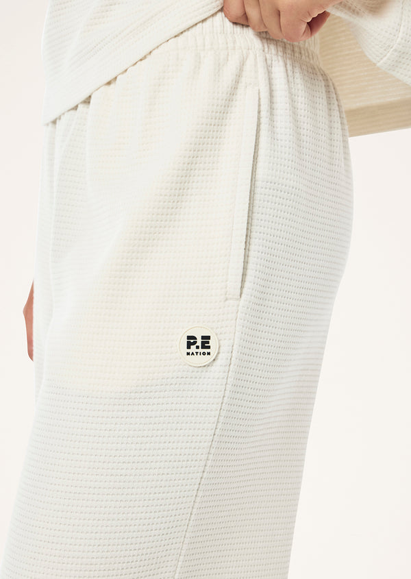 p.e nation Printemps waffle trackpant in whisper white