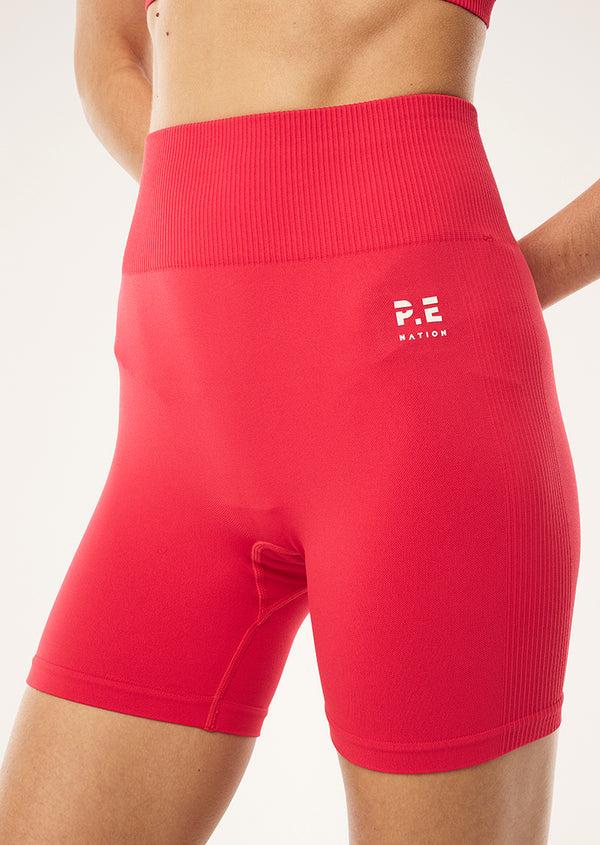 p.e nation Restore seamless 5" bike short in strawberry