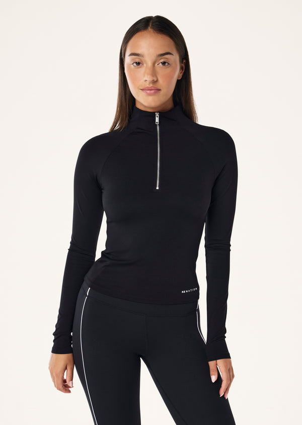p.e nation Routine quarter zip long sleeve top in black