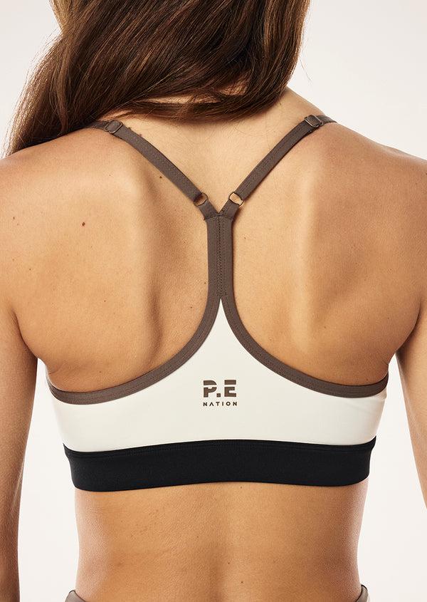 P.e Nation Signature Sports Bra In Whisper White & Walnut