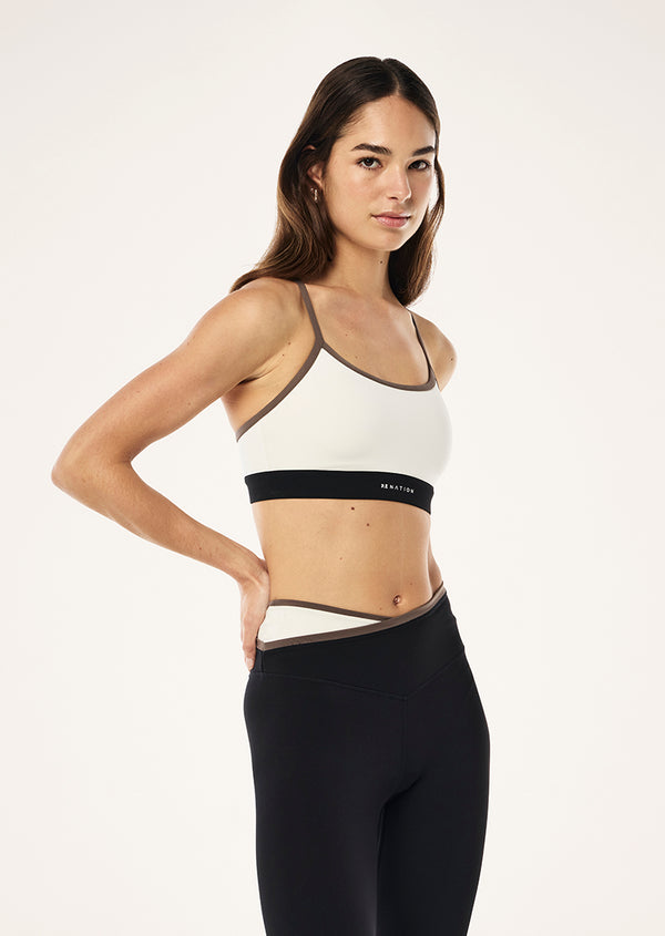 P.e Nation Signature Sports Bra In Whisper White & Walnut