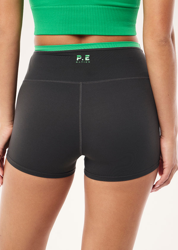 p.e nation Vita 2.5" bike short in caviar & kelly green