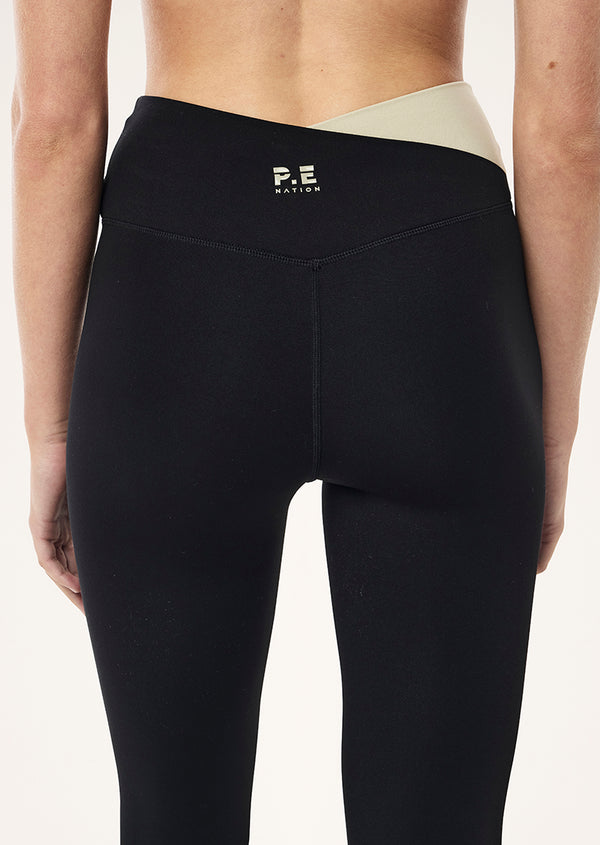 p.e nation Wander full length legging in black & biscuit