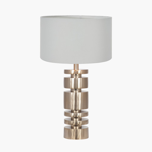 pacific lifestyle Elon Champagne Gold Metal Stacked Cylinder Table Lamp Base with Harry 35cm Ivory Cotton Mix Cylinder Lampshade