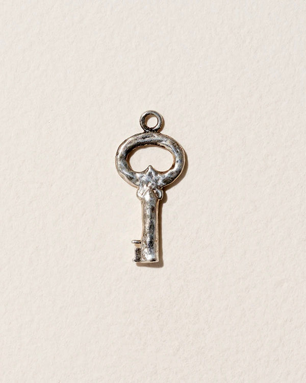 pamela love Fini’s Key Charm