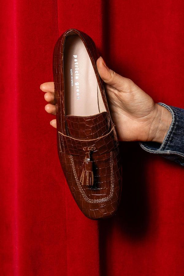 Patricia Green Patricia Green Women’s Beckham Block Heel Tassel Loafer In Cognac Patent Croc