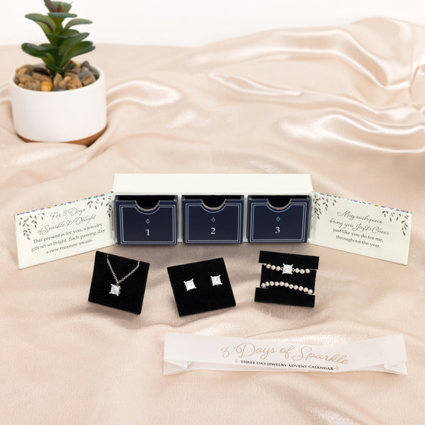 Pavilion Gift Company 3 Days Of Silver Sparkle White Gold Plated Cubic Zirconia Necklace Bracelet And Earrings Set