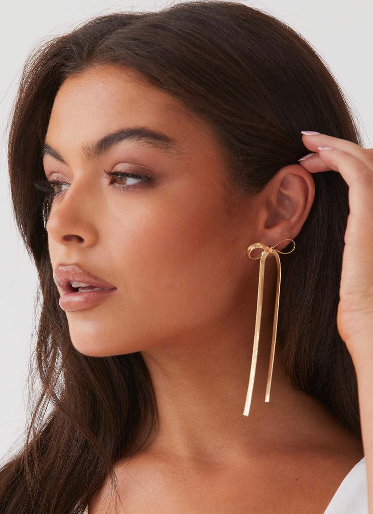 Peppermayo Peppermayo Exclusive - Tinka Bow Earrings - Gold