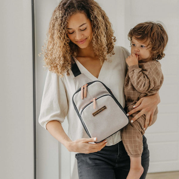 Petunia Pickle Bottom Criss-Cross Sling In Black/Sand