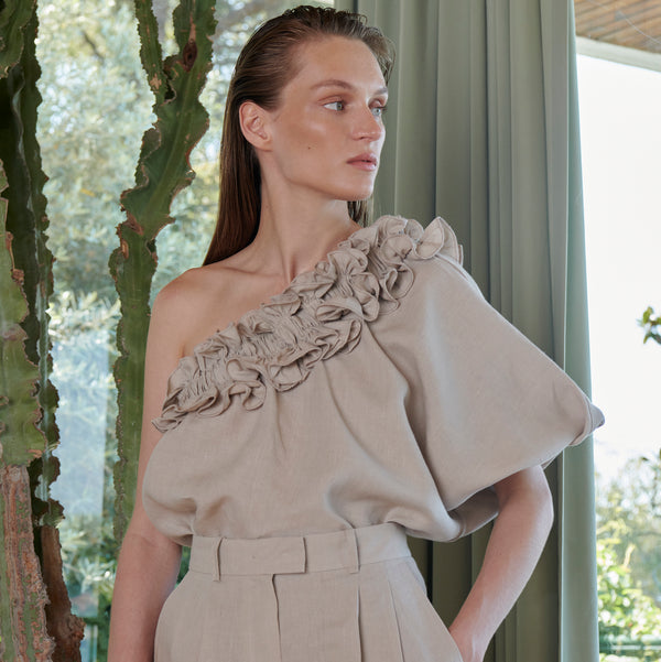 piece of white Ada Top Peanut