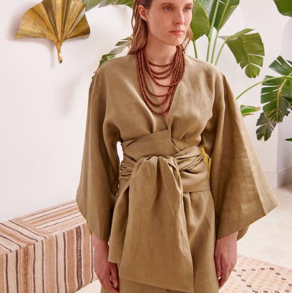 piece of white Amara Dress Olive