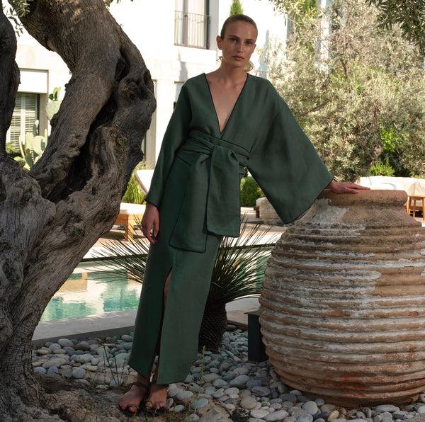 piece of white Amyra Dress Teal Green