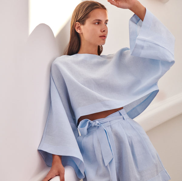 piece of white Maya Top Light Blue