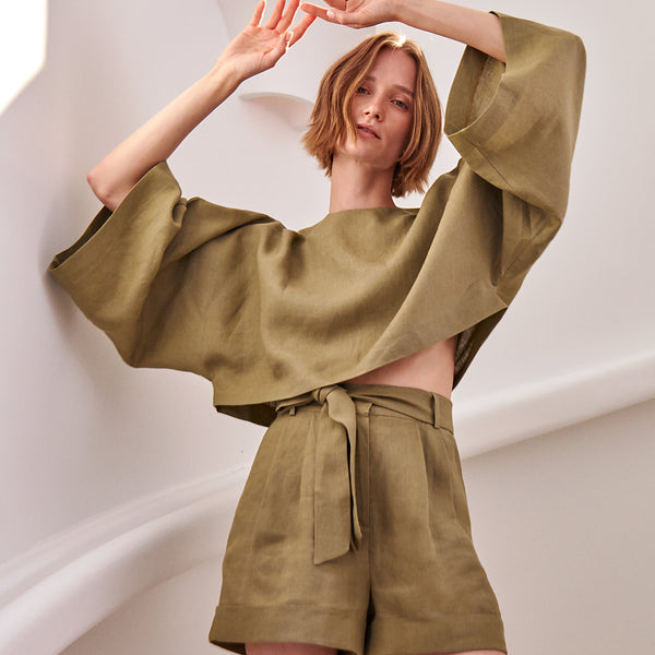 piece of white Maya Top Olive