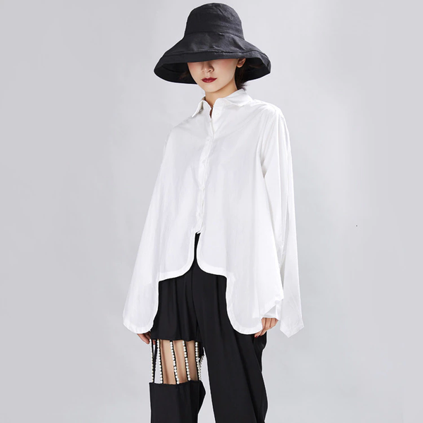 pin up girl Sonoya Irregular Tulip Hem Oversized Shirt in White Cotton | Marigold Shadows