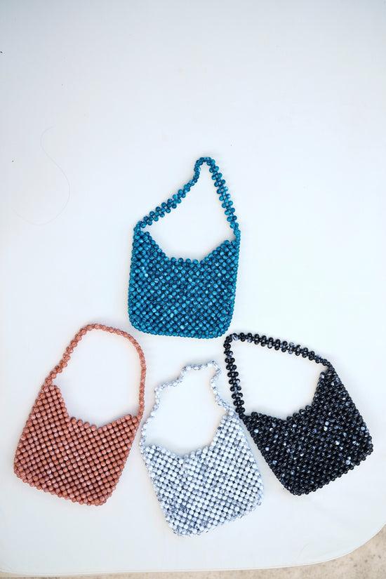 Pink Haley Aurora Beaded Clutch In Marble Mauve