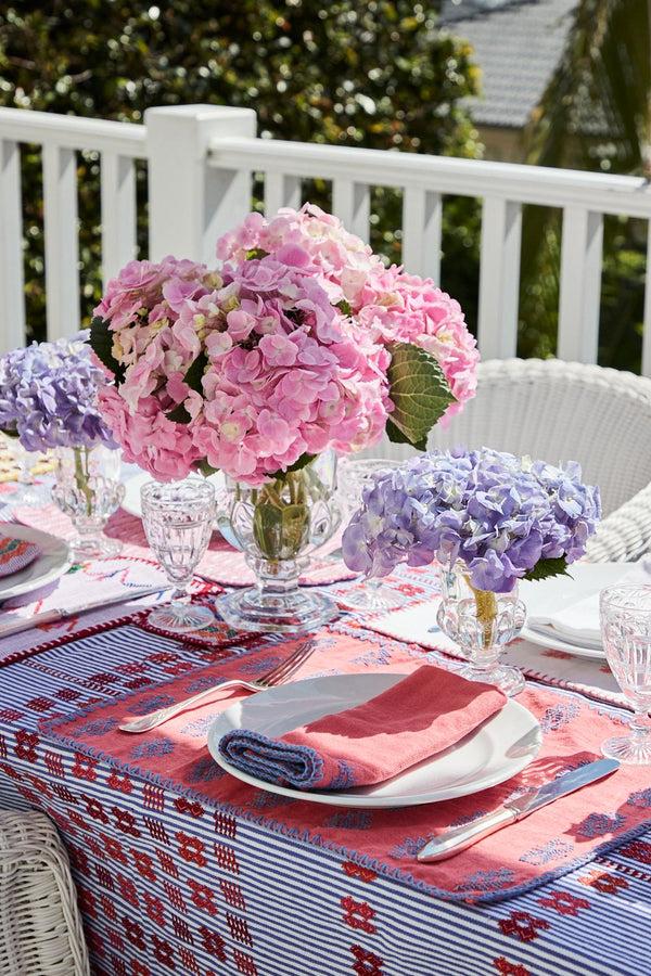 pippa holt Set No.169 Napkin coaster and placemat set in white and blue stripe with red design
