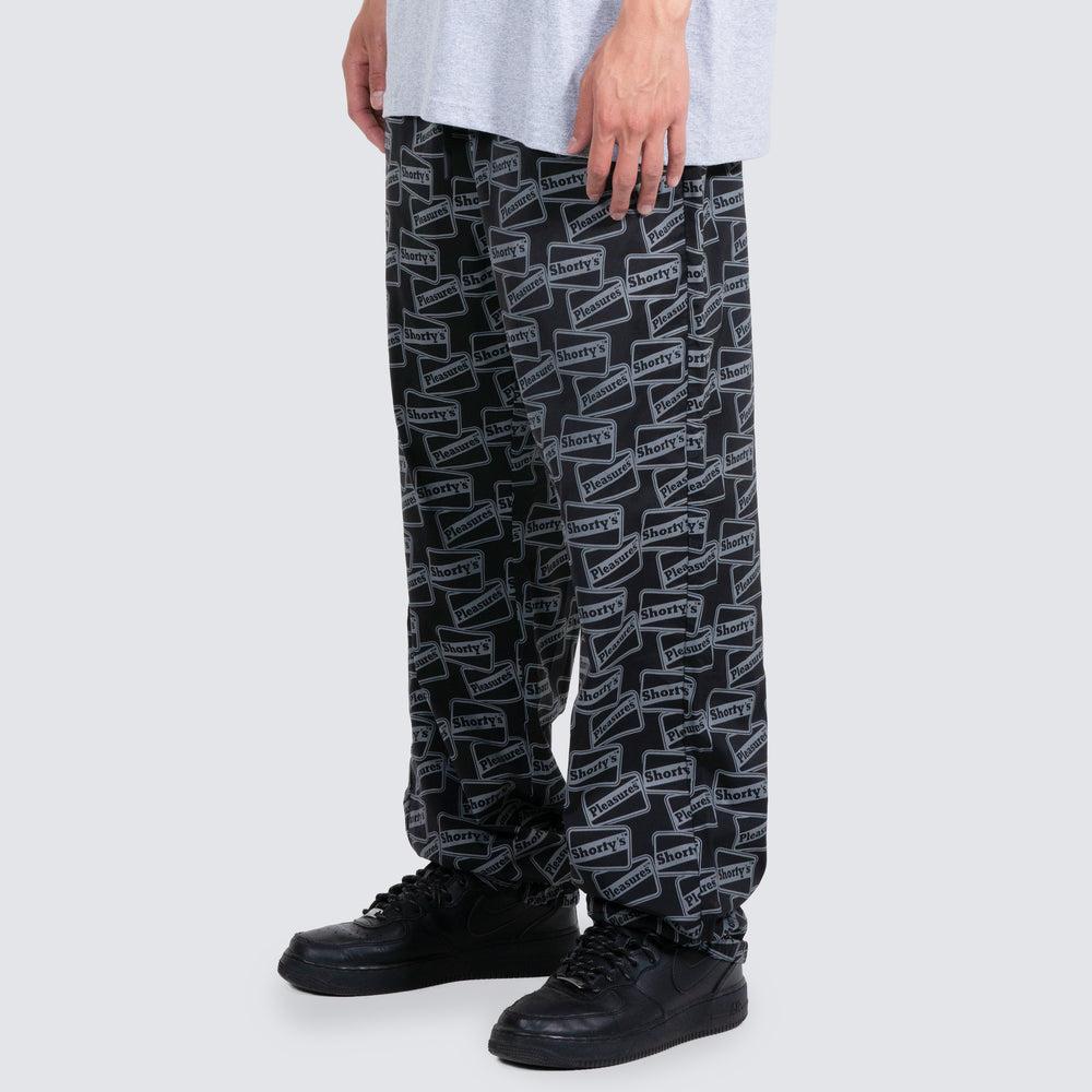 Pleasures REFLECTIVE TRACK PANTS