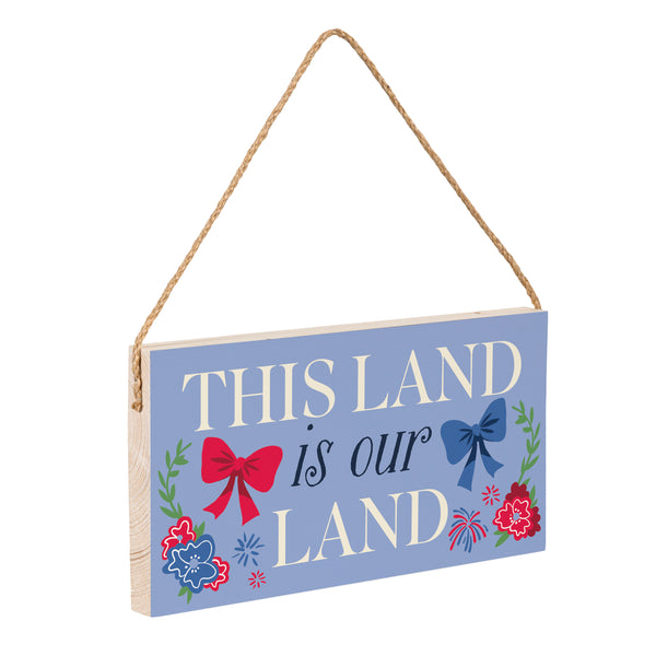 Plow & Hearth American Classic Red White & Bows Wood Hanging Sign W/ Rope "This Land Is Our Land" 11"x6"