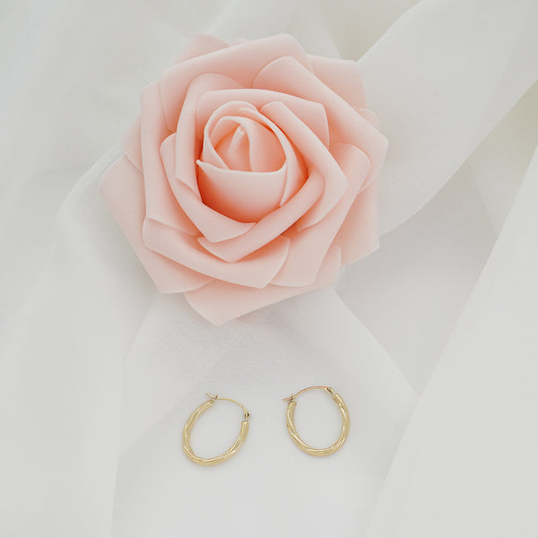 Pori Jewelers 14K Gold Twisted Oval Diamond Cut Hoop Earrings