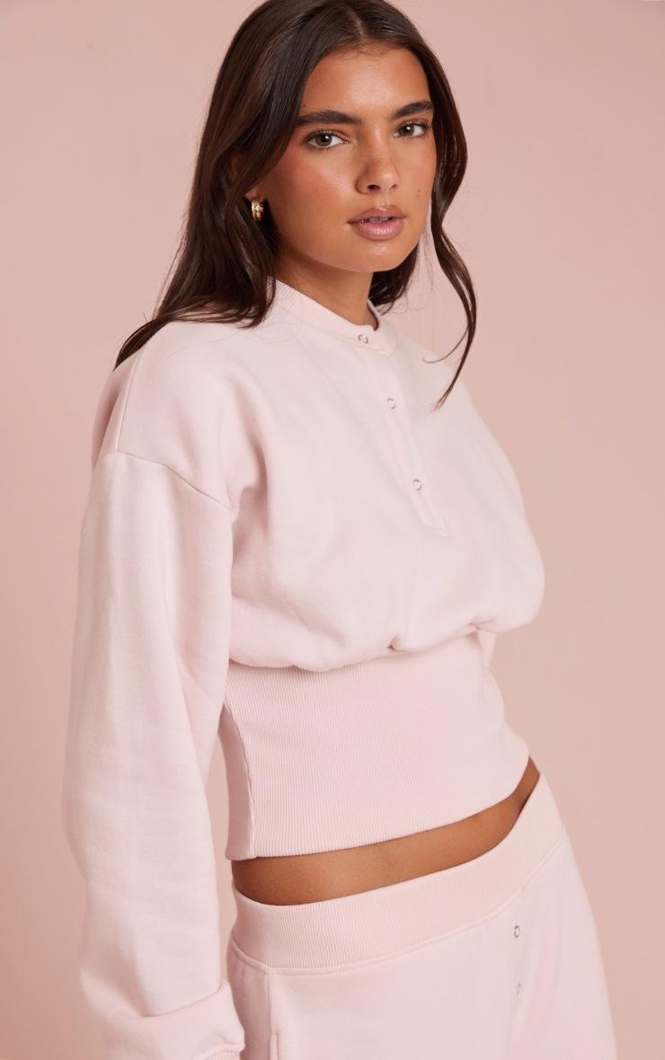 Pretty Little Thing Baby Pink Button Up Cinched Sweatshirt
