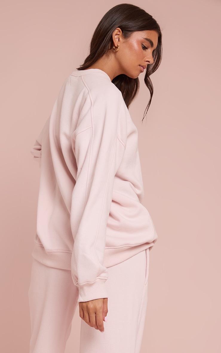 Pretty Little Thing Baby Pink PLT Embossed Crew Neck Sweatshirt