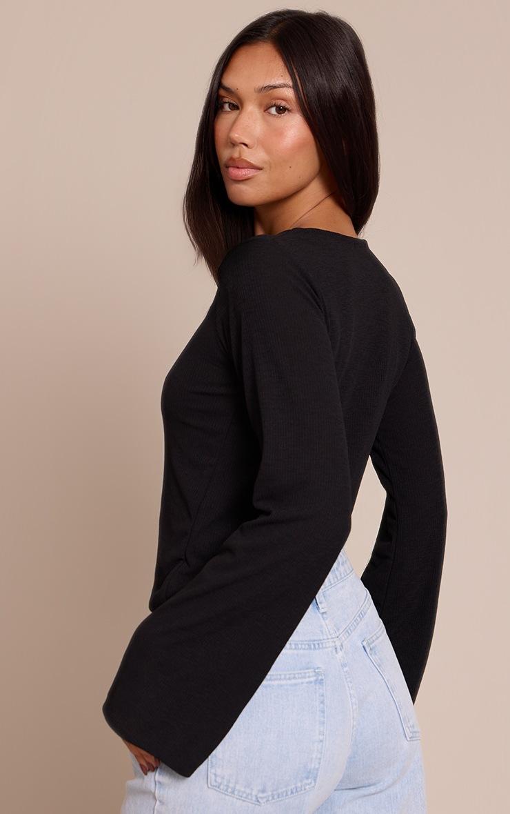 Pretty Little Thing Black Rib Onion Skin Flare Long Sleeve Top