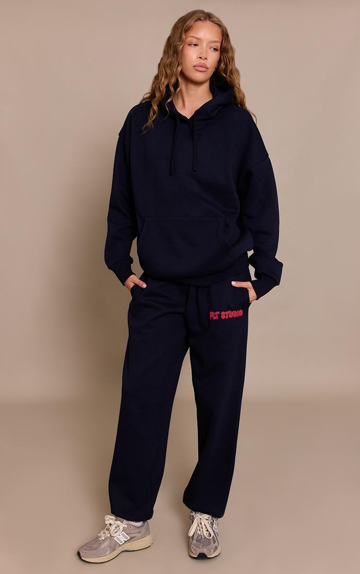 Pretty Little Thing Dark Navy PLT Studio Print Cuffed Sweatpants