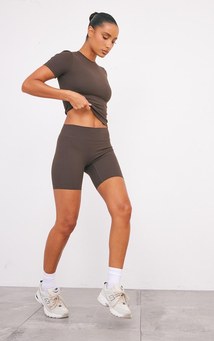 Pretty Little Thing Espresso Ultimate Sculpt Longline Short Sleeve Gym Top