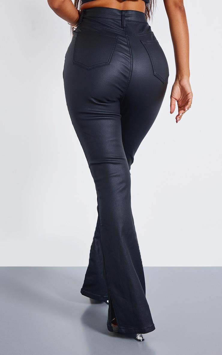 Pretty Little Thing Petite Black Coated Denim Split Hem Flares