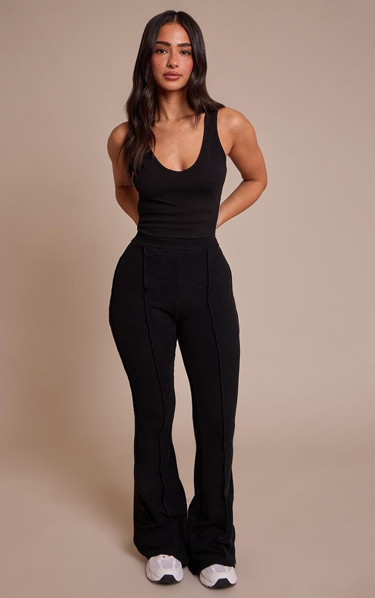 Pretty Little Thing Petite Black Rib High Waist Seam Detail Flared Pants