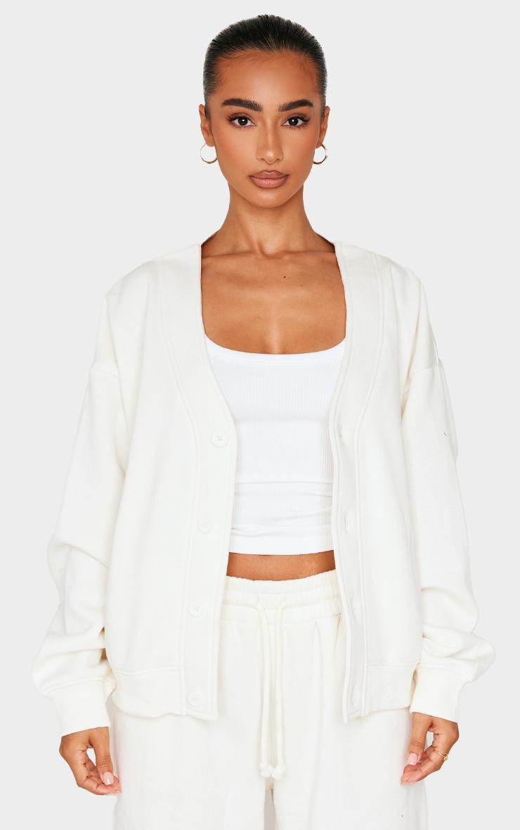 Pretty Little Thing Petite Cream Button Up Side Pocket Sweatshirt