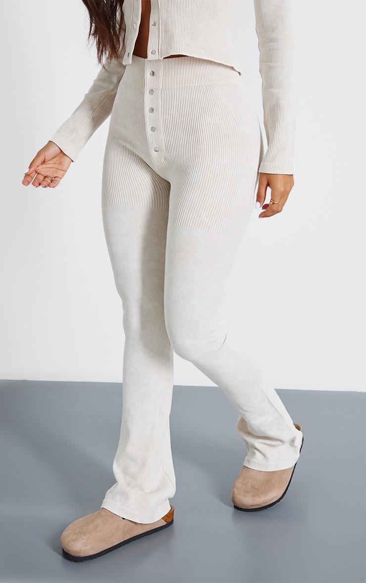 Pretty Little Thing Petite Cream Faded Snatched Rib Button Detail Flare Leggings